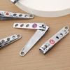 Venta al por mayor de fábrica 0817-agujero cortaúñas brillante cortaúñas brillante pequeño regalo cortaúñas herramientas de manicura