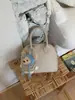 Bolso de Concha Casual Simple de Nicho Nuevo Estilo Primavera/Verano 2026 Bolso de Hombro para Mujer con Diseño Único Bolso Cruzado de Moda