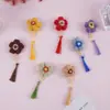 Material hecho a mano tejido flor borla accesorios para cabello largo aretes pinza para el cabello accesorios al por mayor flor de lana DIY