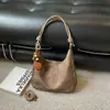 Bolso de Mujer Color Sólido de Moda 2026 Principios de Otoño Nuevo Tendencia Vintage Gran Capacidad Moda Nicho Personalidad Bolso Tote de Hombro