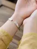 Pulseira estilo étnico nova de 2023 pulseira aberta vintage fosca antiga com Coração de Lótus Sutra para mãe