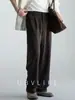 Pantalones Casuales de Lana Lyocell para Hombre con Doble Pinza Cintura Semi-Elástica Otoño 2026 Pierna Ancha Fluida Pierna Recta Adelgazante