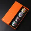 Taza de Té de Cerámica de Jingdezhen Esmalte Nueve Melocotones Taza Maestra Taza Individual Tazón de Té Pequeño Juego de Tazas de Té Caja de Regalo Venta al por Mayor
