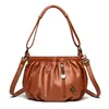 Bolso de mujer de moda transfronterizo, bolso cubo minimalista urbano, bolso cruzado para mujer, bolso de hombro casual de nicho de alta gama
