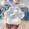 El producto transfronterizo más vendido de Rusia: Juguete gigante de fresa para aliviar el estrés, juguete de pata de gato para apretar, juguete blandito de pata de gato de rebote lento