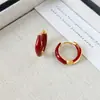 Aretes Geométricos Rojos Ankela Festivos de Año Nuevo Nicho Temperamento Venta Caliente Aretes de Botón Otoño/Invierno 2026 Venta al por Mayor de Pendientes