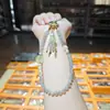 Colgante de cadena para teléfono móvil llavero con cuentas DIY para mujer accesorio colgante de jade estilo antiguo llavero decorativo para bolso