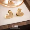 Pendientes de botón de corazón de doble capa cepillados simples retro Clips para orejas de bobina perfumada de nicho europeo y americano Pendientes dulces versátiles