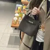 Bolso pequeño tipo cubo de piel de vaca de primera capa para mujer, Bolso de mano de alta gama para el trabajo, Bolso de hombro de piel de vaca Togo, Bolso cruzado para el trabajo