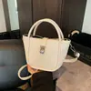 Bolso Cubo para Mujer con Acabado de Alta Gama, Bolso de Mano Transfronterizo de Moda con Patrón de Lichi, Nuevo Bolso Cruzado Estilo Cesta Elegante 2026