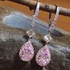 Pendientes colgantes de circonita rosa súper brillante Cao Shi Nuevos pendientes de cristal exquisitos Pendientes de moda de alta gama con forma de pera