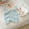 Traje de punto calado de estilo occidental para niña de verano 2025, conjunto de dos piezas de chaleco con tirantes y falda de capullo de flor para bebé