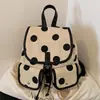 Mochila de diseño de lunares de estilo coreano, modelo nuevo 2026, mochila grande de alta capacidad para el día a día con múltiples bolsillos, mochila escolar para estudiantes