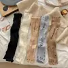 Calcetines holgados Otoño/Invierno 2025 para mujer, calentadores de piernas, calcetines de pantorrilla grises claros de moda, cubrecalcetines estilo rasgado, venta al por mayor de fábrica