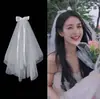 Li Yitong com véu curto pequeno de noiva véu bufante adorno de cabeça foto de casamento