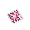 Fabricantes profesionales producen logo tejido ropa de comercio exterior cuello bolsa de lona lateral logo bordado logo de tela