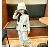 Chaleco de Lana de Cordero para Niñas Estilo Otoño e Invierno para Bebés y Niños Pequeños Cuello Redondo Bolsillos Lazo Chaleco de Peluche Ropa Exterior para Niños Chaleco