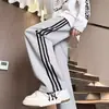 Pantalones deportivos casuales de estilo americano con tres rayas para hombre, pantalones de calle para hombre para primavera y otoño, pantalones de chándal ligeros de pierna recta para adolescentes