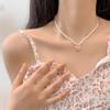 Colar de Pérolas de Luxo Acessível de Alta Qualidade para Mulheres Estilo Ins Coração Sexy Contas Corrente para Clavícula Acessórios Elegantes Versáteis Atacado