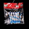 Una generación de accesorios para empaquetar árboles de Navidad 7cm plástico muletas pequeñas colgante decorativo en stock venta al por mayor