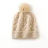 Cachemira Otoño/Invierno 2026 Nuevo Gorro de Punto Grueso Cálido de Moda para Mujer, Color Sólido, Tejido de Cable con Pompón, Informal
