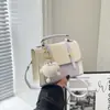 Bolsa Pequena para Mulheres Primavera/Verão 2026 Novo Design de Nicho Bolsa de Ombro Único Transversal Bolsa de Mão Tendência Feminina Personalizada Bolsa Quadrada Pequena