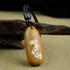 Colgante Taoísta de Madera de Azufaifo Incrustada con Plata Colgante de Mantra de Nueve Caracteres con Incrustaciones de Madera Morada Llavero Adorno de Zhao Gongming Venta al por Mayor Personalizada