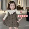 Bebé niña conjunto ligero de otoño 2026 nuevo vestido de tirantes con estampado floral estilo coreano vestido base estilo bosque