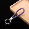 Chaveiro de corda de couro pingente de carro acessórios corda de chave de corda de couro trançado pu para empurrar pequenos presentes fabricantes atacado