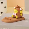 Novo suporte de celular Sanrio desenho animado desktop legalomi pequena decoração boneca máquina melody pequeno presente atacado
