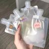 Spot 30ml50ml100ml pequena amostra líquida flip cover auto-portante saco de bico de sucção portátil de emulsão de viagem saco dispensador