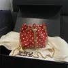 Moda de Verano Bolso Cruzado Sencillo de Lunares con Cadena para Mujer 2026 Nuevo Bolso Cubo de Cordón de Color Sólido Bolso Nube