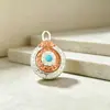 Colgante de bolsa giratorio de nueve casillas de doble cara estilo étnico, llavero, colgante, accesorio, regalo pequeño, al por mayor