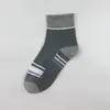 [Esportivo e Casual] Meias de outono 7A antibacterianas e resistentes a odores, comprimento médio até a panturrilha masculina, meias esportivas com blocos de cor, versáteis e quentes