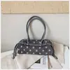 Bolso de axila de lunares estilo coreano de nicho para mujer, nuevo de moda otoño 2026, versátil, de alta gama, para ir al trabajo, de hombro y cruzado