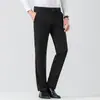 Pantalones de vestir elásticos para hombre, nueva colección otoño 2026, color liso, corte recto, tela fluida, aptos para el trabajo, elasticidad en cuatro direcciones, pantalones casuales, talla grande
