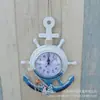 Reloj de pared creativo estilo mediterráneo azul y blanco timón timonel ancla reloj reloj de pulsera electrónico decoración reloj de navegación
