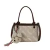 Bolso pequeño súper popular para mujer, nuevo y moderno bolso de cubo de verano para el trabajo, de hombro y cruzado
