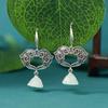 Pendientes de estilo étnico vintage de imitación de jade hetiano, orquídea magnolia Xiangyun, estilo antiguo, nuevos pendientes de moda de lujo ligeros de estilo chino.