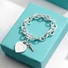 Pulsera para Pareja Etiqueta Inglesa en Forma de Corazón Marca T Cierre de Amor Ot Esmalte Azul Anillo de Corazón Melocotón Joyería Estilo Ins Transfronterizo