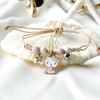 Nuevo pulsera de grulla de papel elegante artística perla femenina tejida de dibujos animados pulsera de cerámica Pinduoduo joyería transfronteriza