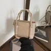 Bolsa pequena estilo explosivo popular deste ano para mulheres verão 2026 nova moda bolsa de ombro único transversal bolsa de balde de mão transfronteiriça