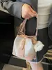 Bolso Pequeño Exquisito de Alta Apariencia de Moda para Mujer Modelo Nuevo 2026 Tela de Parches Estilo Nacional Bolso Cubo de Hombro Bolso Cruzado de Nicho