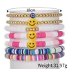 Pulsera de moda coreana nueva multicapa de línea elástica, pulsera de cerámica suave con carita sonriente encantadora, traje de pulsera de perlas retro hecha a mano para mujer