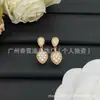 Suministro Exclusivo Transfronterizo de Nuevos Modelos de Aretes Marca Gu, con Etiquetas, Venta al por Mayor de Aretes Marca Fen, Du, Bao, Shi y Mei, con Álbumes de Fotos Disponibles