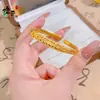 Pulsera Abierta de Oro Sand Gold Pavo Real para Mujer, Pulsera Exquisita de Nicho de Lujo Ligero, Regalo para Mejor Amiga, Nuevo Artículo Caliente 2026