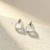 Elegantes aretes de cristal en forma de corazón, transparentes como el hielo, en dos tonos morado claro y transparente, aretes de botón de diseño de nicho simples y elegantes para mujer