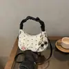 Bolsa de Mão Doce para Menina 2026 Nova Fashionável Elegante Fofa Design de Nicho Tendência Chique Bolsa de Ombro Transversal