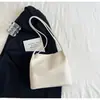 Bolso casual transfronterizo de gran capacidad para mujer, nuevo bolso tote de moda, color liso simple, versátil para ir al trabajo, bolso de hombro único bajo el brazo