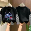 Camiseta de manga larga para niño 2026 nuevo modelo, camiseta básica de dibujos animados para niño, camiseta interior de algodón puro a rayas para otoño, estilo primavera y otoño